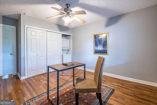 520 Park Ave SE Unit 10, Atlanta, GA 30312 - office with wood finished floors, baseboards, ceiling fan, a textured ceiling, and stacked washer / drying machine