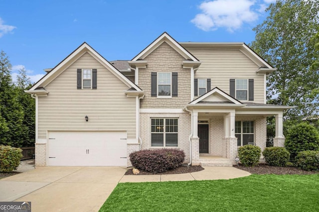 308 Evening Rain Crst, Canton, GA 30114 - craftsman inspired home with an attached garage, concrete driveway, brick siding, a front lawn, and a porch