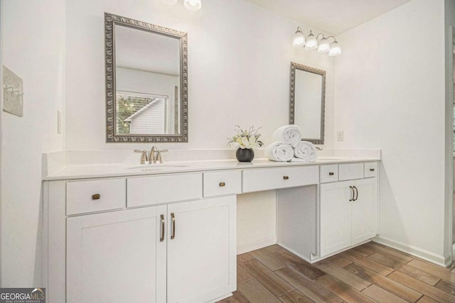 308 Evening Rain Crst, Canton, GA 30114 - bathroom featuring double vanity and wood finished floors