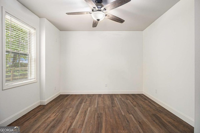 308 Evening Rain Crst, Canton, GA 30114 - unfurnished room featuring dark wood finished floors, healthy amount of natural light, and a ceiling fan