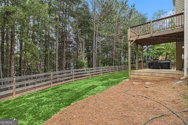 308 Evening Rain Crst, Canton, GA 30114 - fenced backyard with a hot tub and a deck