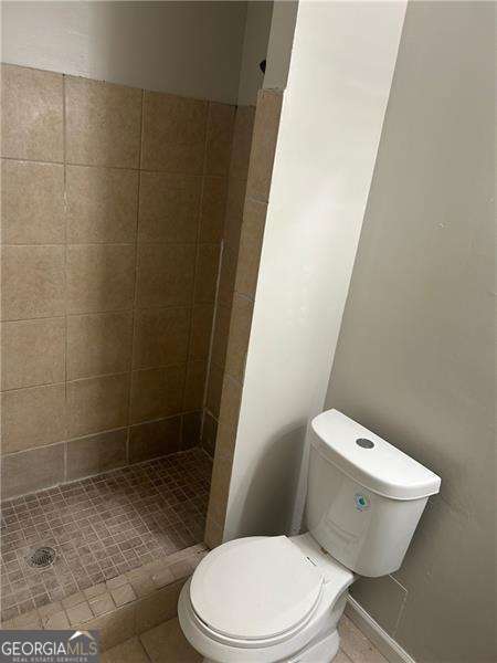 8922 Gatewood Cir, Jonesboro, GA 30238 - full bath with a shower stall and toilet
