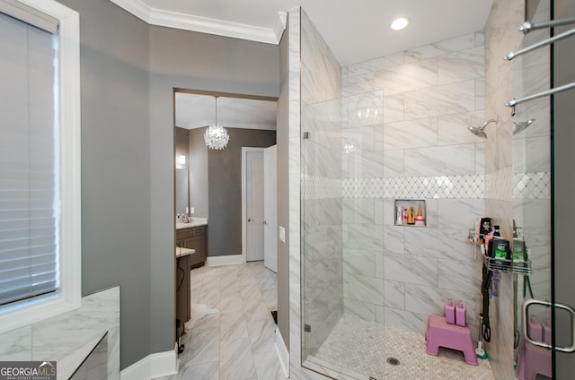 full bath featuring crown molding, a shower stall, vanity, baseboards, and an inviting chandelier