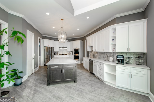 kitchen featuring appliances with stainless steel finishes, open shelves, and recessed lighting