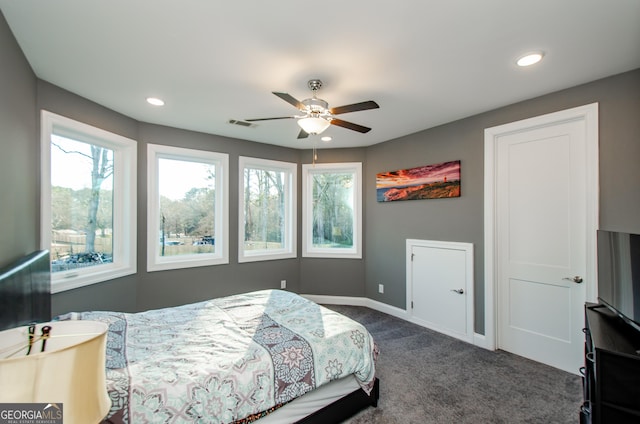 bedroom featuring recessed lighting, baseboards, dark carpet, and visible vents