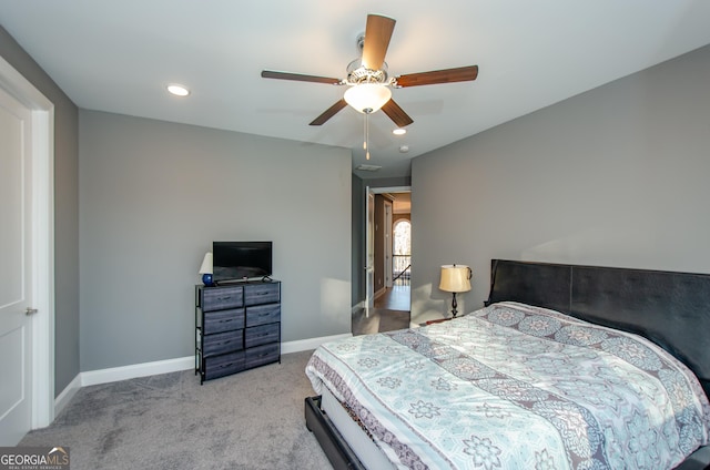 carpeted bedroom with baseboards, a ceiling fan, and recessed lighting