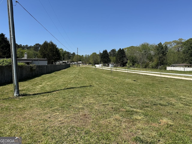 view of yard featuring fence