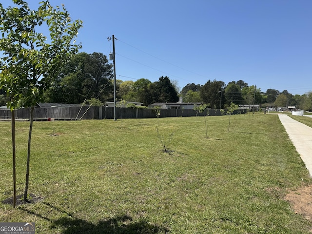 view of yard featuring fence
