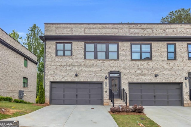 3493 Monarch Ave, Duluth, GA 30096 - view of front of property with a garage, concrete driveway, and brick siding