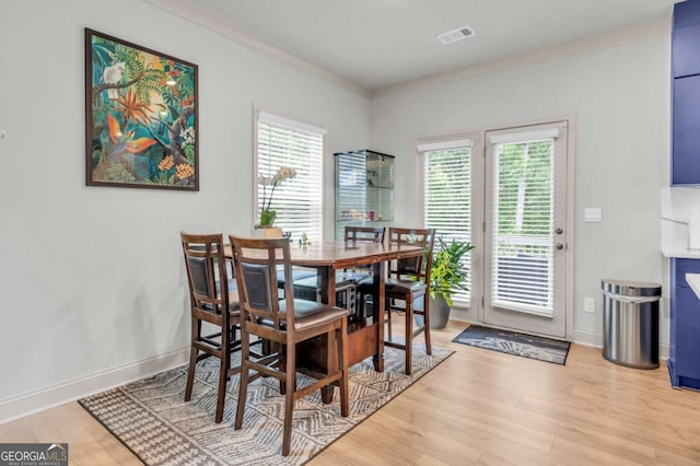 3493 Monarch Ave, Duluth, GA 30096 - dining room featuring baseboards, visible vents, a wealth of natural light, and light wood finished floors