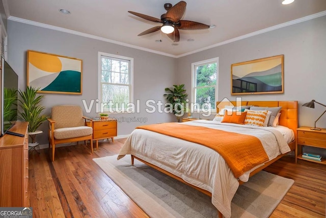 bedroom with recessed lighting, baseboards, crown molding, and hardwood / wood-style flooring