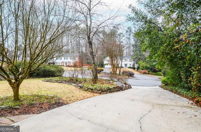 surrounding community featuring a lawn