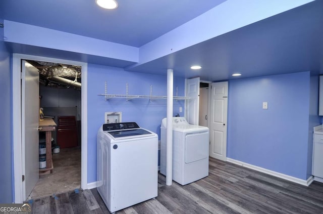 clothes washing area with laundry area, wood finished floors, baseboards, recessed lighting, and washer and clothes dryer