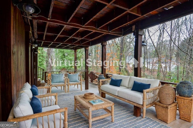 sunroom / solarium with outdoor lounge area