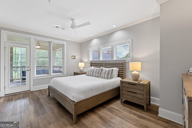 1010F Tailwater, Greensboro, GA 30642 - bedroom featuring access to exterior, crown molding, visible vents, wood finished floors, and baseboards