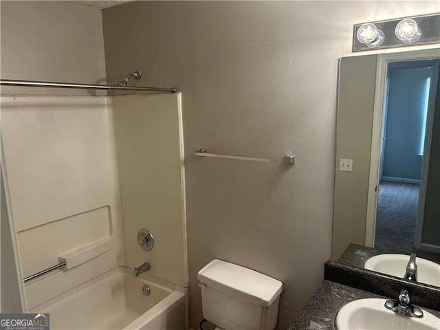 full bath featuring toilet, shower / bath combination, and vanity