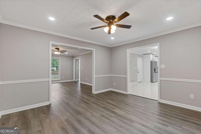 470 Brackin Trce, Grayson, GA 30017 - unfurnished room featuring a textured ceiling, a ceiling fan, baseboards, recessed lighting, and wood finished floors