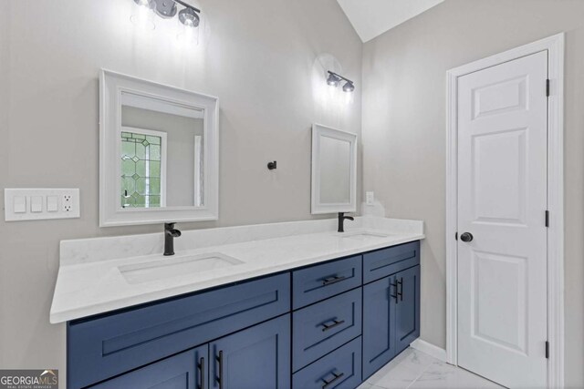 470 Brackin Trce, Grayson, GA 30017 - full bathroom featuring double vanity, a sink, and marble finish floor