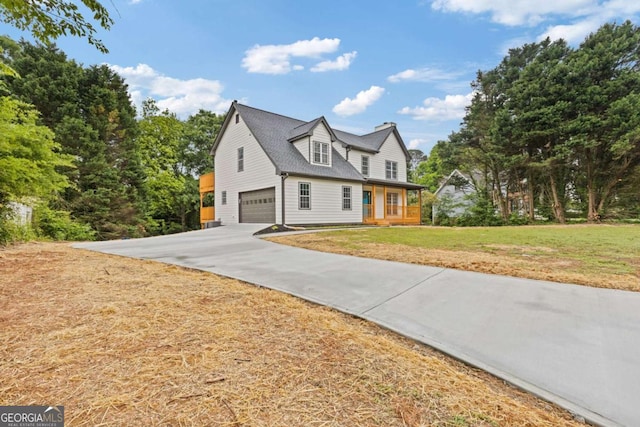 470 Brackin Trce, Grayson, GA 30017 - view of side of home with an attached garage, a porch, a yard, and concrete driveway