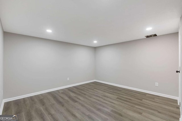470 Brackin Trce, Grayson, GA 30017 - spare room featuring wood finished floors and recessed lighting