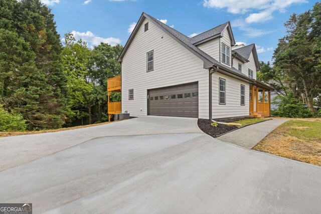 470 Brackin Trce, Grayson, GA 30017 - view of property exterior with a garage and concrete driveway