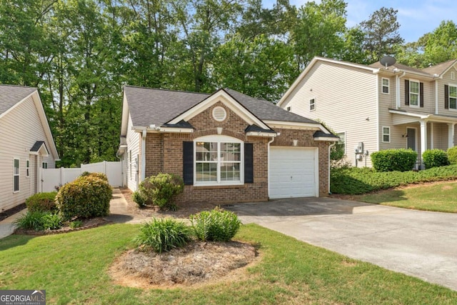 171 Nacoochee Way, Canton, GA 30114 - view of front of home featuring a garage, brick siding, driveway, and a shingled roof