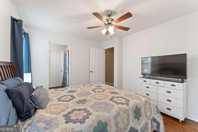171 Nacoochee Way, Canton, GA 30114 - bedroom featuring dark wood-style flooring, a ceiling fan, and baseboards