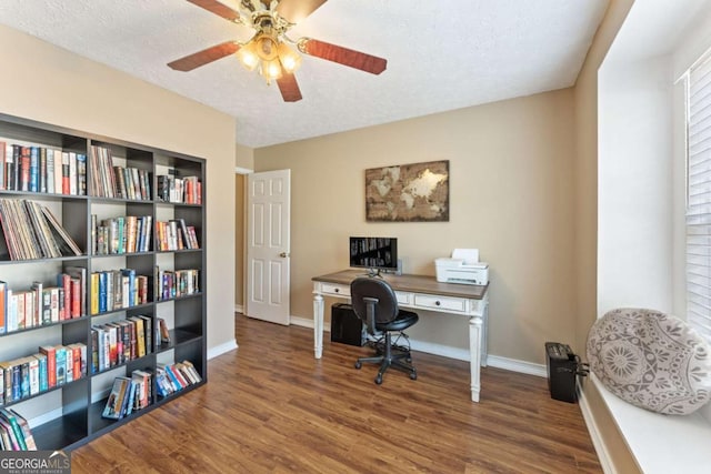 171 Nacoochee Way, Canton, GA 30114 - home office featuring wood finished floors, baseboards, ceiling fan, and a textured ceiling