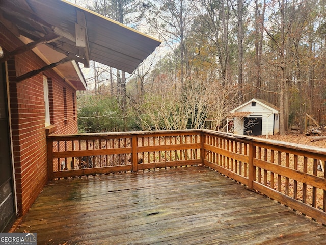 wooden deck featuring an outdoor structure