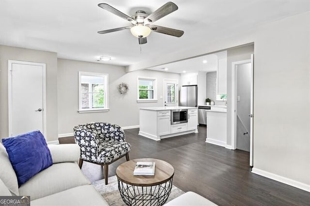 1140 Starline Dr SE, Smyrna, GA 30080 - living room featuring a ceiling fan, baseboards, recessed lighting, and dark wood-style floors