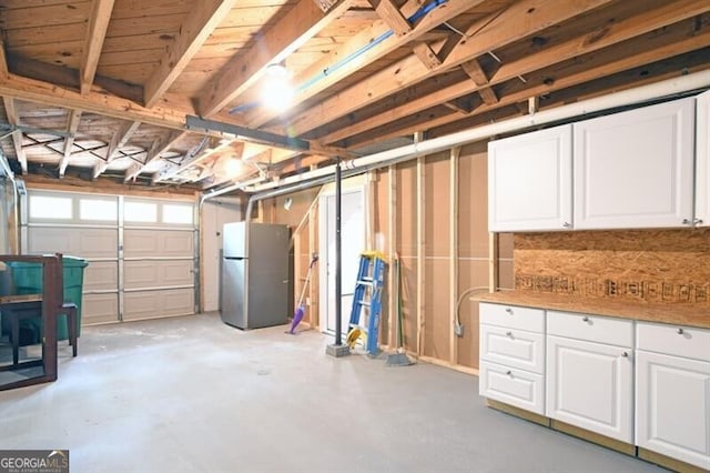 1140 Starline Dr SE, Smyrna, GA 30080 - garage featuring freestanding refrigerator