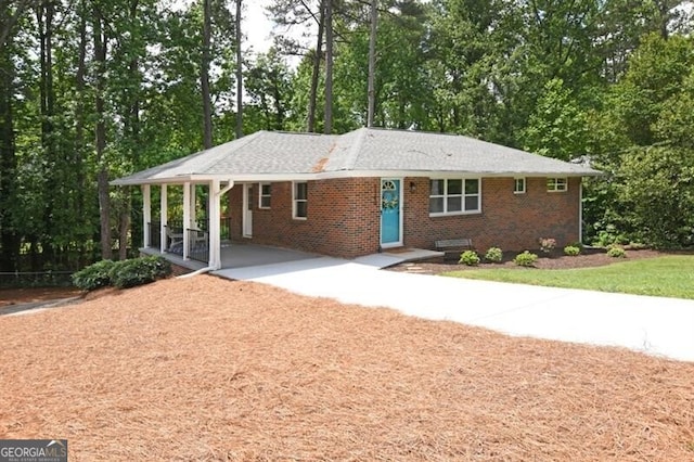 1140 Starline Dr SE, Smyrna, GA 30080 - view of front of house with brick siding and driveway
