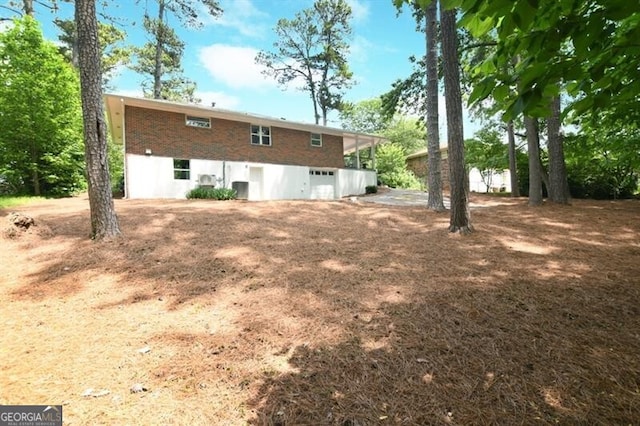 1140 Starline Dr SE, Smyrna, GA 30080 - rear view of property featuring central air condition unit