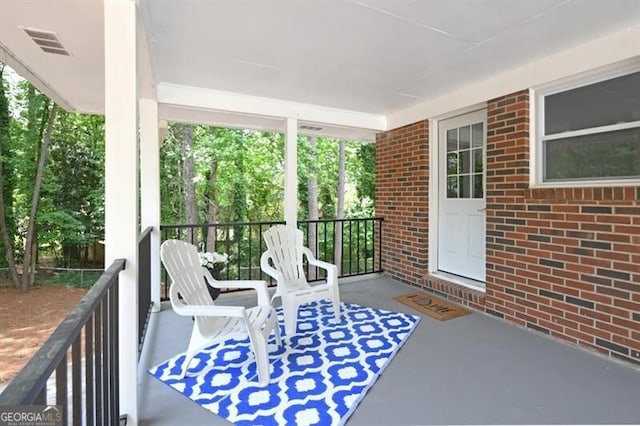 1140 Starline Dr SE, Smyrna, GA 30080 - exterior space featuring a wealth of natural light and visible vents