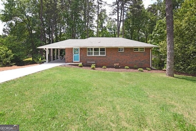 1140 Starline Dr SE, Smyrna, GA 30080 - single story home with an attached carport, concrete driveway, a front lawn, and brick siding