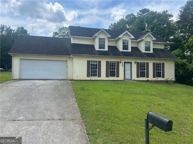 5340 Forest Pl, Stone Mountain, GA 30088 - new england style home featuring driveway, a front lawn, and a garage