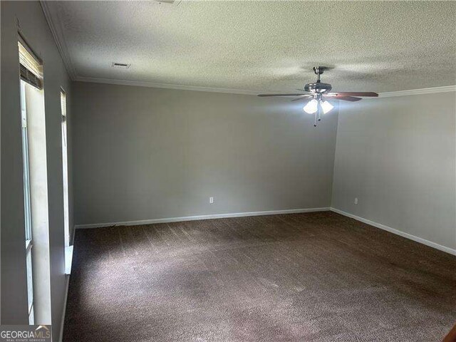 5340 Forest Pl, Stone Mountain, GA 30088 - carpeted spare room featuring ceiling fan, ornamental molding, and a textured ceiling