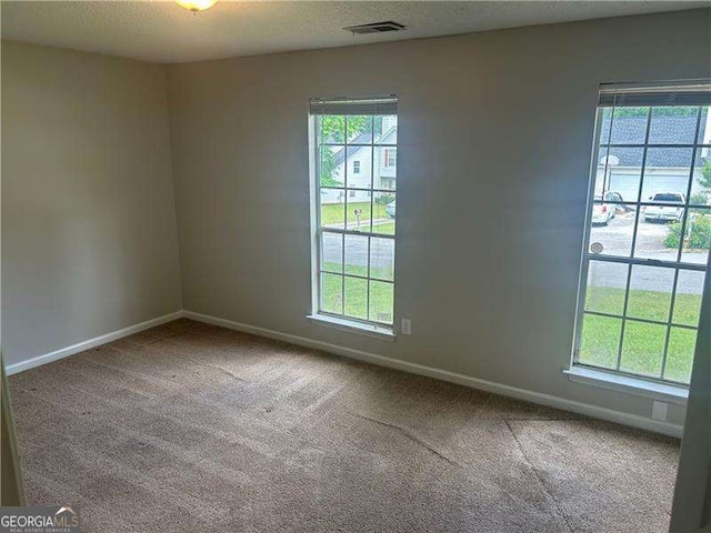 5340 Forest Pl, Stone Mountain, GA 30088 - carpeted spare room with healthy amount of natural light