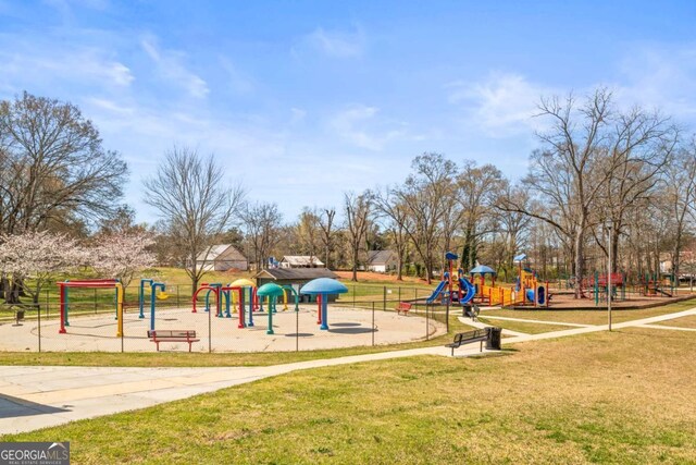 12348 Hillcrest Dr, Hampton, GA 30228 - community play area featuring a yard