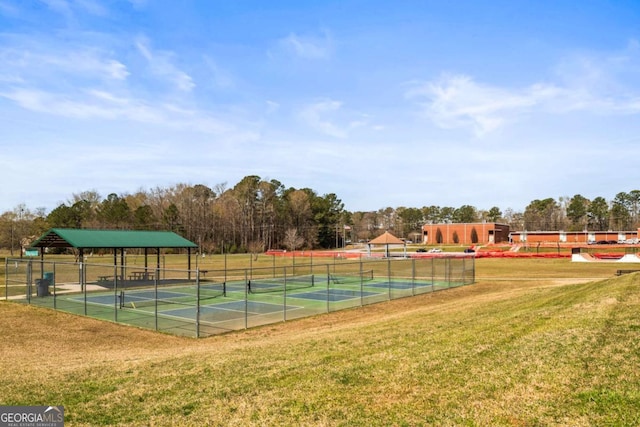 12348 Hillcrest Dr, Hampton, GA 30228 - view of tennis court with fence and a yard