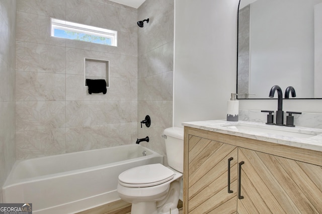 bathroom with shower / bathtub combination, toilet, and vanity