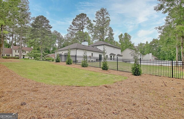 view of yard with fence