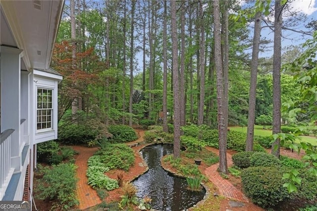 769 Hampton Pl SW, Marietta, GA 30064 - view of yard with a garden pond