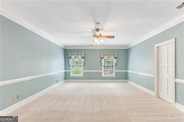 769 Hampton Pl SW, Marietta, GA 30064 - spare room with carpet floors, ceiling fan, ornamental molding, and baseboards