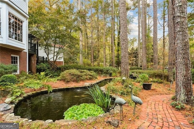 769 Hampton Pl SW, Marietta, GA 30064 - view of yard with a garden pond