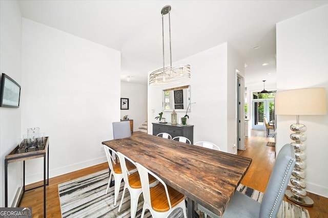 1676 Carroll Dr NW, Atlanta, GA 30318 - dining area featuring baseboards, recessed lighting, and wood finished floors