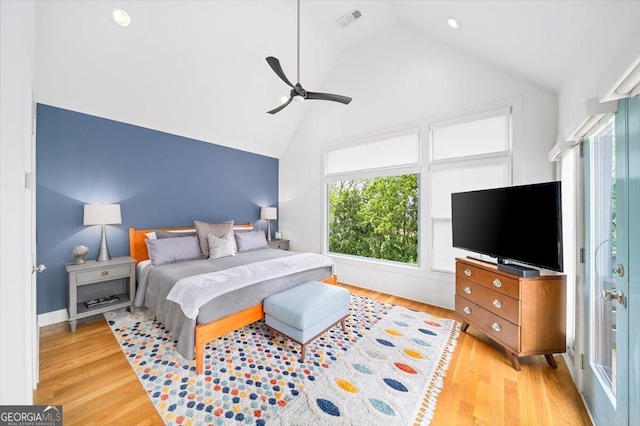 1676 Carroll Dr NW, Atlanta, GA 30318 - bedroom featuring visible vents, a ceiling fan, lofted ceiling, and wood finished floors
