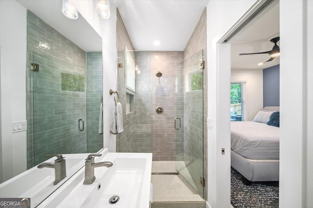 1676 Carroll Dr NW, Atlanta, GA 30318 - ensuite bathroom featuring connected bathroom, ceiling fan, a shower stall, and vanity