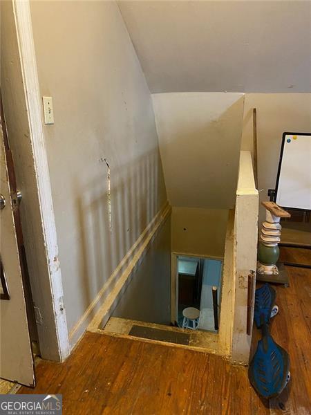 2689 Knox St, Atlanta, GA 30317 - stairs featuring wood finished floors