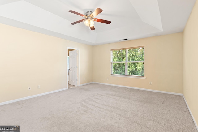 3845 New Salem Ct, Cumming, GA 30040 - empty room featuring a tray ceiling, carpet, and ceiling fan